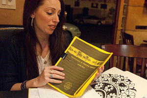 East County's Christie holds the newly released TIP Report (photo: Ron Logan)