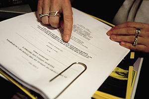 Carrie Christie examines the Petition for Writ of Habeus Corpus (photo: Ron Logan)
