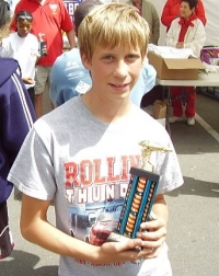 Twelve year old Bryce Taylor of Santee with his trophy from winning the Stock division. This is the second straight year that Taylor has won in La Mesa and his second year of racing.