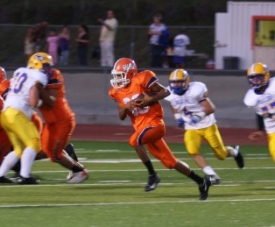 Jevon Hasten eludes Grossmont defenders